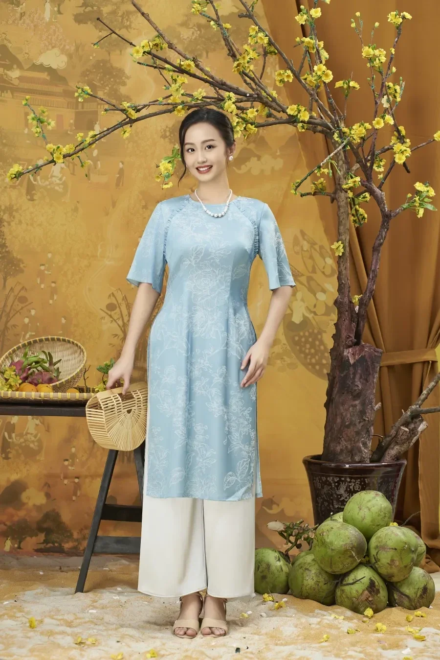 Mẫu áo dài đẹp màu xanh dương nhẹ nhàng
